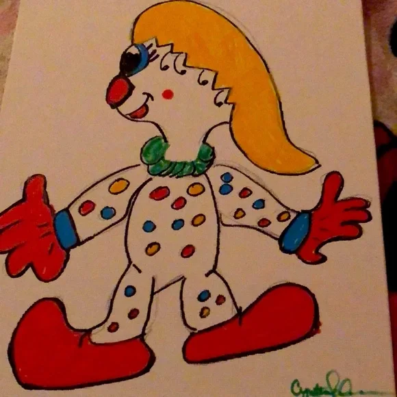Vibrant Red and Yellow Clown Toy with Polka Dots - Picture 1 of 1